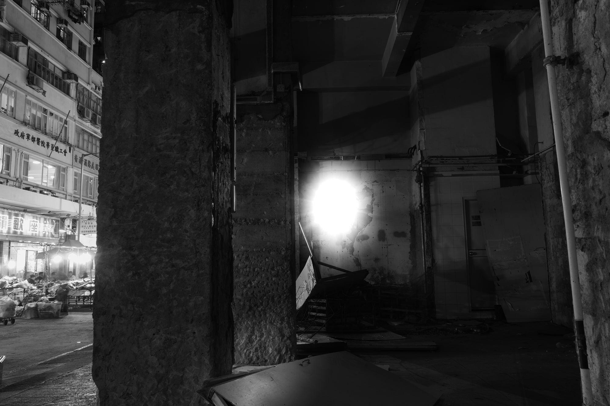 Nostalgia (2019) – figure surrounded by amber light orbs.